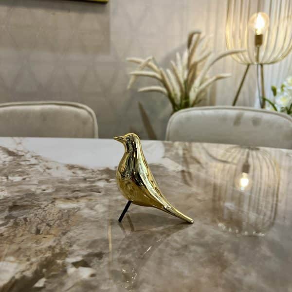 פסל ציפור יושבת מיני זהב / ניקל