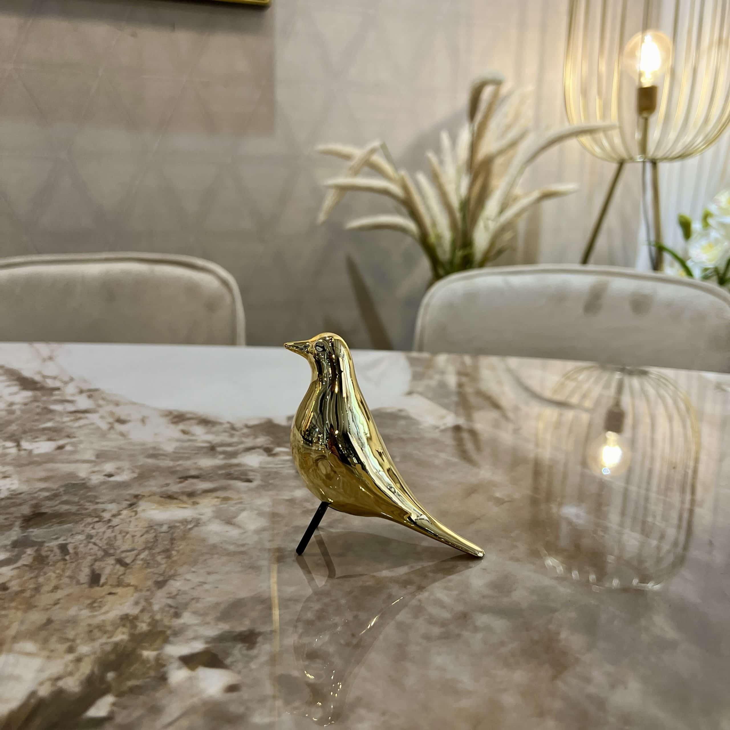 פסל ציפור יושבת מיני זהב / ניקל פסל ציפור יושבת מיני זהב / ניקל